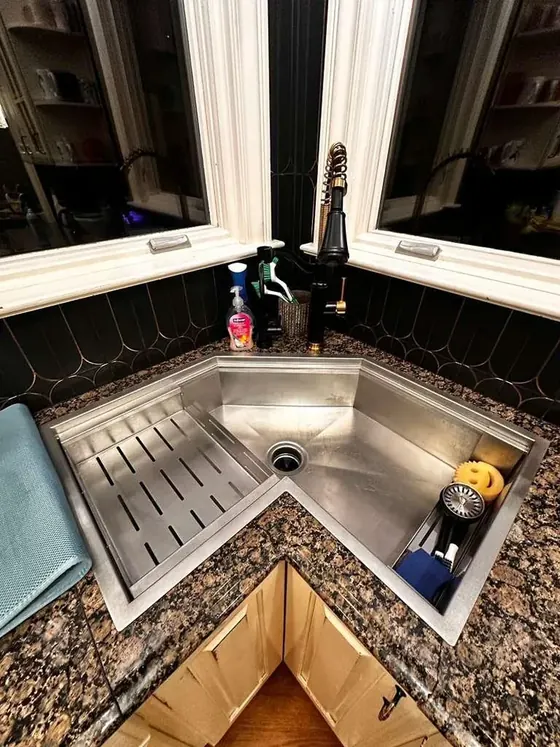 The same corner sink after cleaning