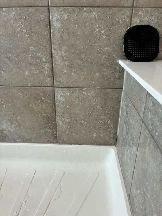 The same shower grout after cleaning