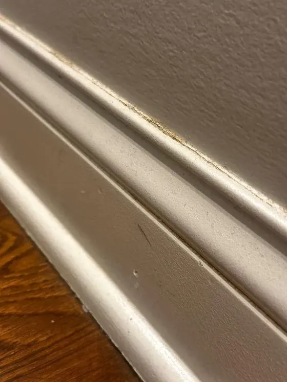 Baseboards before cleaning